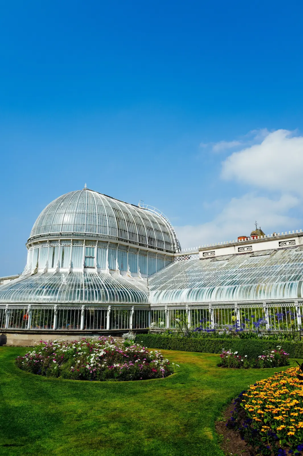 Palm House amid flower beds at Belfast Botanic Gardens