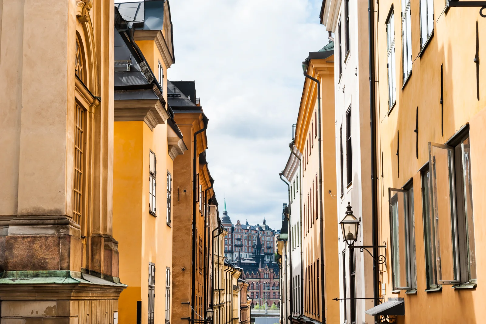 Narrow street lined with colourful buildings in Stockholm's Old Town