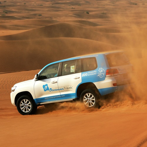 Morning Desert Safari: Dune Bashing, Sandboarding and Camel Rides