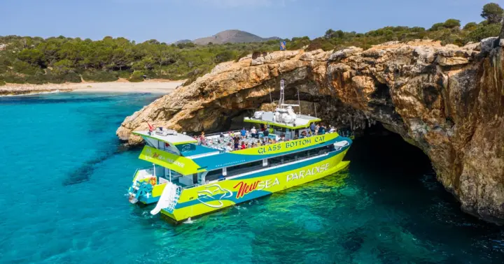From Calas de Mallorca: Scenic Glass-Bottom Boat Tour