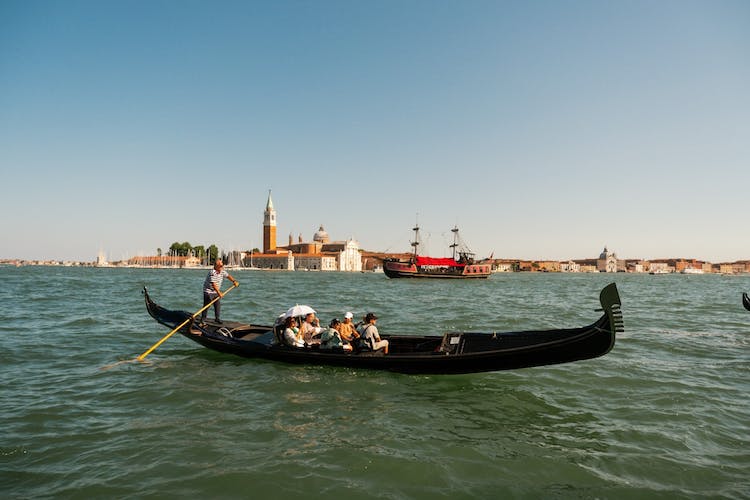 Shared gondola ride underneath the Bridge of Sighs