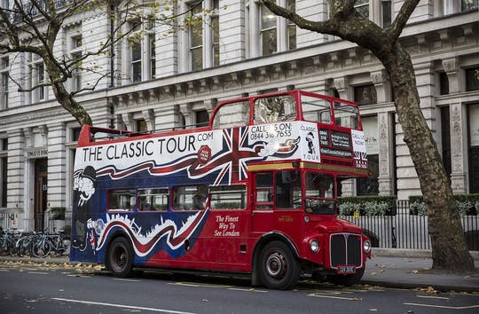 Classic London sightseeing tour in a vintage bus