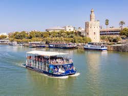 Autobús y barco turístico de Sevilla